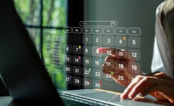 Calendar,Planner,,Businessman,Using,Laptop,To,Highlight,Appointment,Reminders,And